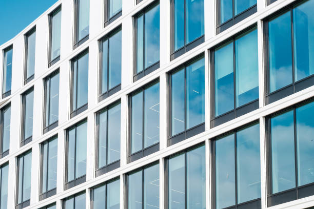 istock real estate facade, modern office building 1268505777