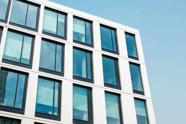 istock real estate facade, modern office building 1268505779