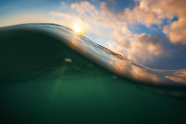 istock Sea wave close up, low angle view, sunrsie shot 1268505831