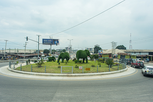 Port Harcourt/Rivers State, Nigeria - September 11th 2018: Pictures from a photowalk through the city of Port Harcourt showing a round about at a major road intersection