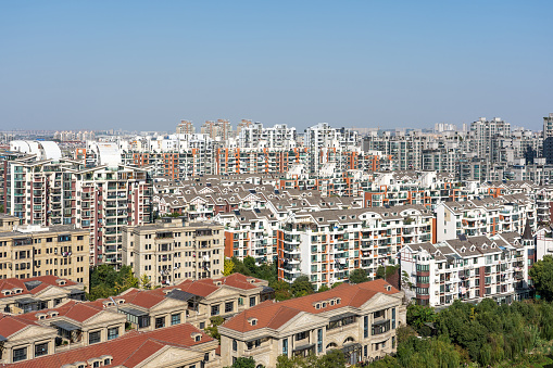 Skyline of Regular Chinese City Suburb on a Sunny Day. Common Buildings in Residential District. Modern Generic Architecture in Shanghai.