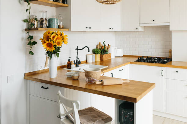 istock Dishes and utensils on kitchen table, ready to cook. 1268509686