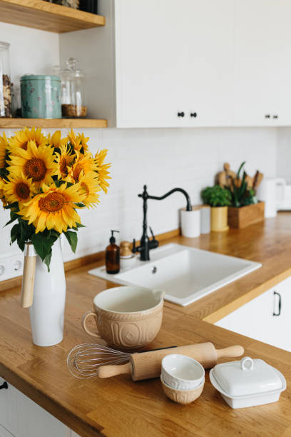 istock Dishes and utensils on kitchen table, ready to cook. 1268509813