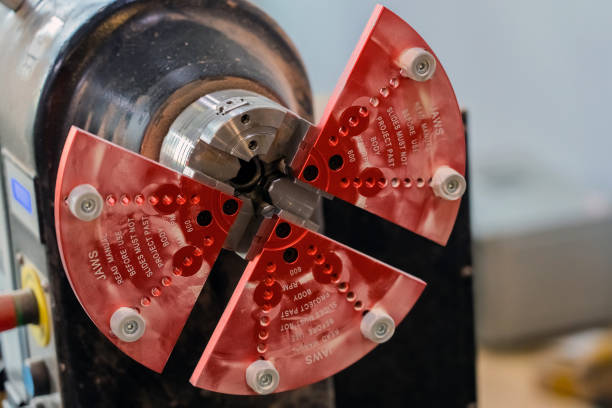 istock Installed red parts of jaw grip at workshop. 1268510137