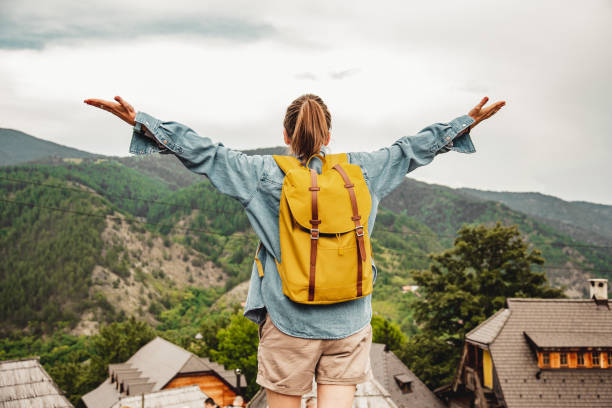 istock Solo tourist with backpack enjoying the nature 1268511656