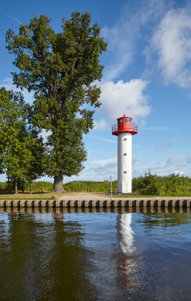 istock Lighthouse at the Uecker river in Ueckermunde on a sunny day. 1268513232