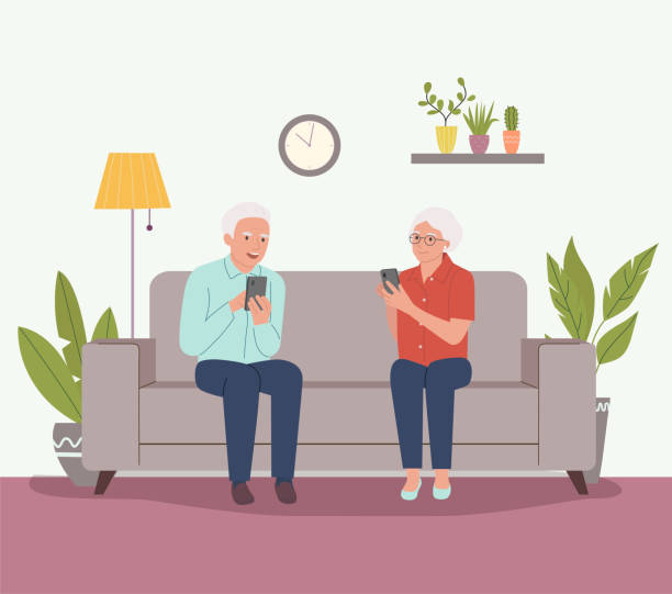 ilustrações, clipart, desenhos animados e ícones de idoso e mulher sentados no sofá e olha para aparelhos na sala de estar. ilustração de desenho animado vetorial. - no sofá com celular