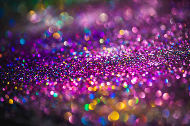 istock glitter bokeh lighting effect Colorfull Blurred abstract background for birthday, anniversary, wedding, new year eve or Christmas 1268513393