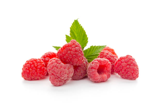 istock Ripe raspberries with leaf isolated on a white background 1268514037