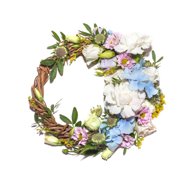 Wreath of defferent flowers isolated on a white background