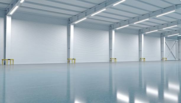 istock New empty warehouse or factory open space 1268535361