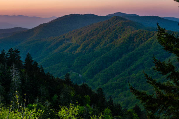 istock Light Catches the Tops Of Mountains 1268538388