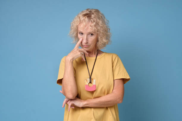 istock Confused caucasian senior woman thinking making a plan. 1268538669