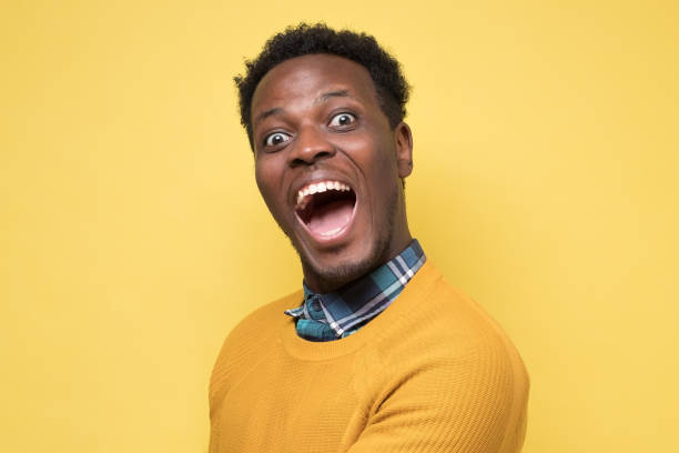 istock Excited african man stares at camera has stunned expression 1268538939