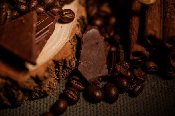 istock composition of coffee beans, shecolade, cinnamon and cocoa 1268548743