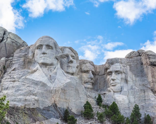 Mount Rushmore Mount Rushmore with Blue Skies mt rushmore national monument stock pictures, royalty-free photos & images