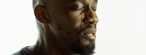 istock African-american young man's close up shot on studio background, flyer 1268550121