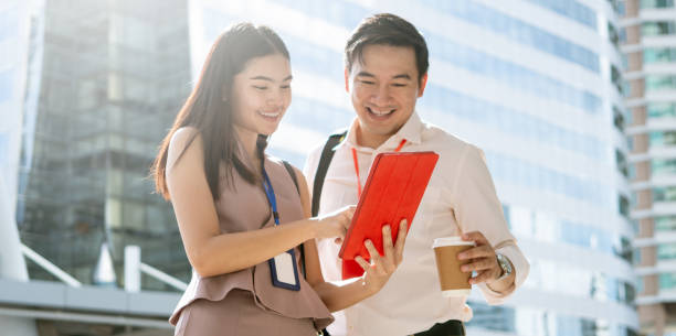 istock Business people talks and work outside the office. 1268551108