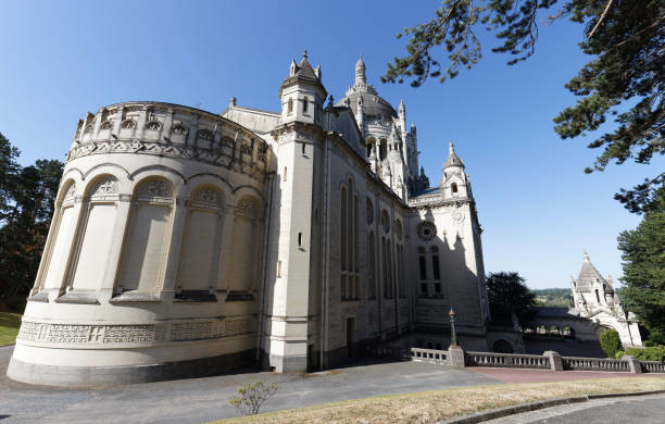 the famous basilica of st. therese of lisieux in normandy, france. - churchgoing imagens e fotografias de stock