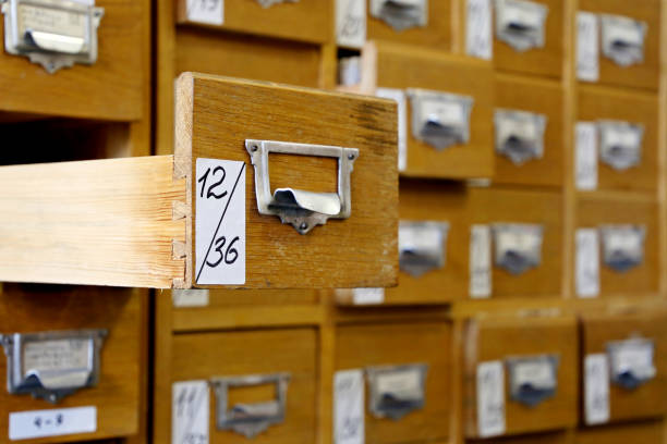 istock Library catalogue cards in old wooden box 1268553922