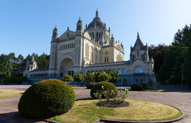 the famous basilica of st. therese of lisieux in normandy, france. - churchgoing imagens e fotografias de stock