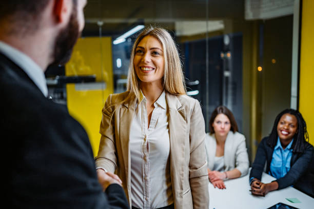 istock Two people handshake on business meeting 1268559816