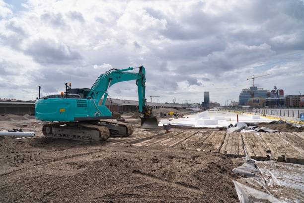 istock Landscape with a large construction site and excavator 1268559863