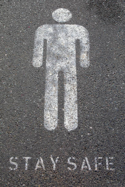 istock Stay Safe Sign on the Pavement in the UK 1268560734