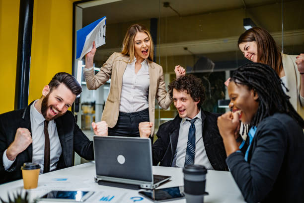 istock Young successful business people at meeting 1268561609