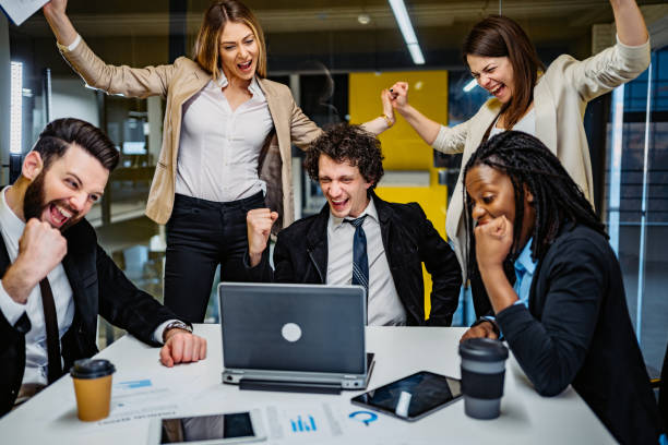 istock Young successful business people at meeting 1268561644