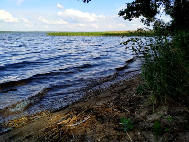 istock wave rolls ashore lake. domestic travelling 1268571007