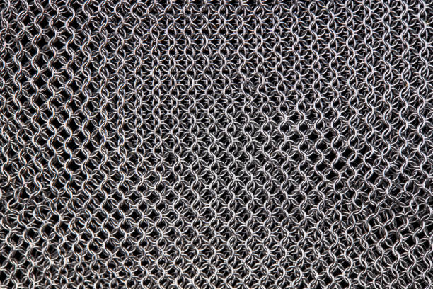 chain mail close up texture background. abstract iron ring backdrop. protection concept chain mail close up texture background. abstract iron ring backdrop. protection concept. chain mail stock pictures, royalty-free photos & images