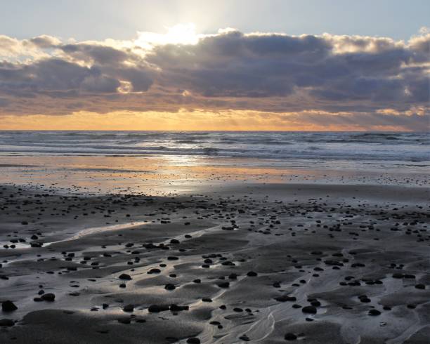 istock Vivid Sunset over the Beach 1268574818
