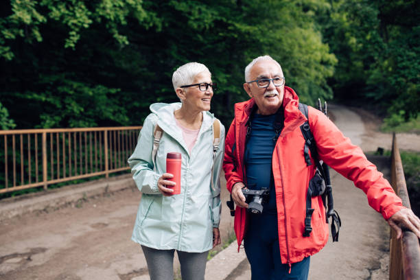 istock Senior adventurers walking and enjoying the nature 1268578901