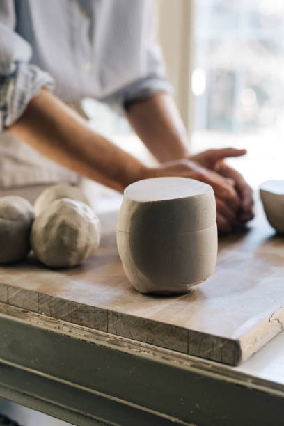 istock A Woman Molding Clay 1268585415