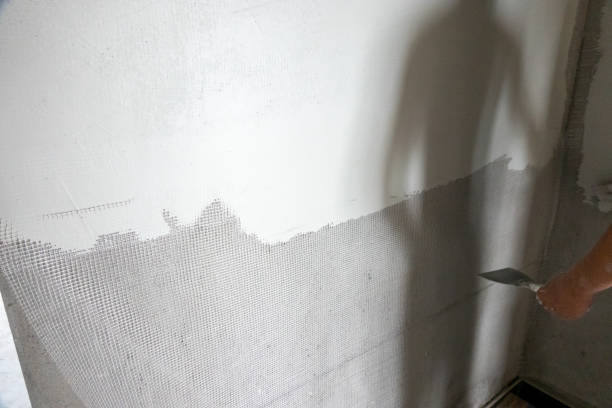istock putty powder on the wall with nylon mesh net 1268593295