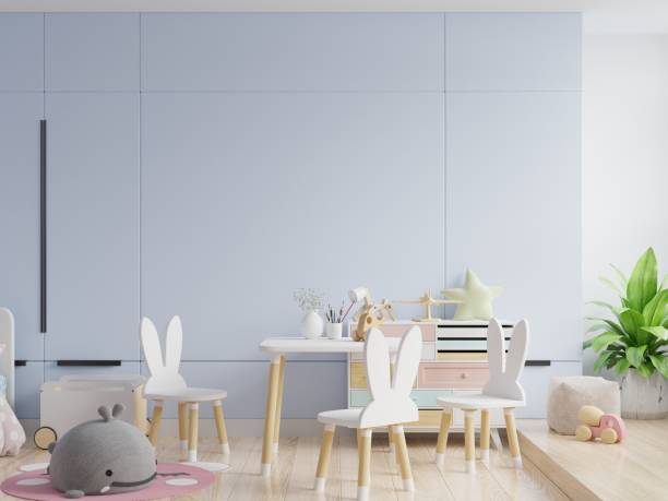 istock Mock up wall in the children's room in blue wall background. 1268593441
