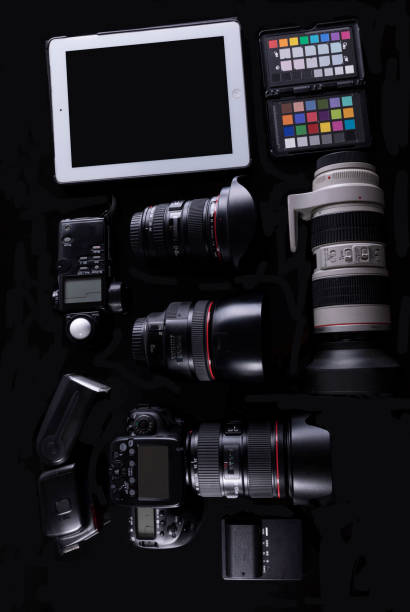 istock professional photographic equipment with digital camera, lenses and accessories. 1268605511