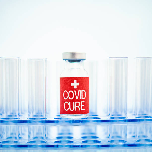 istock Vaccine for Coronavirus Covid-19 on Test Tube Rack 1268607833