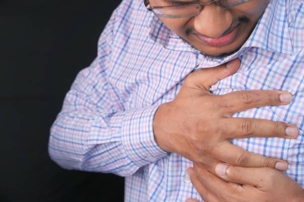 istock young man suffering heart pain close up 1268608028