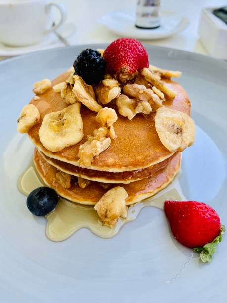 istock Sweet pancakes with strawberry and bananas 1268614927