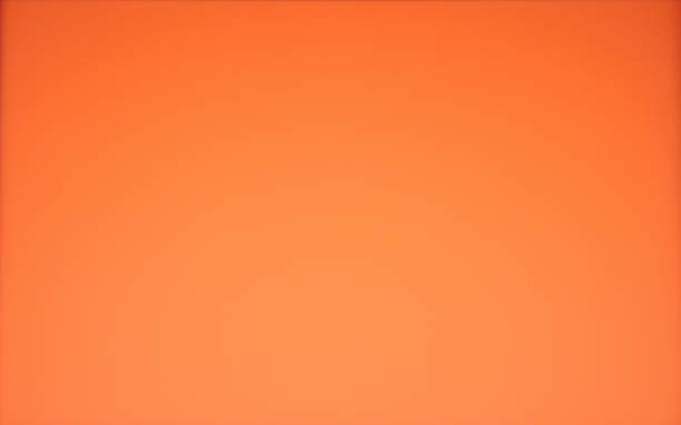 istock Orange monochrome background with gradient and vignetting along the edges. 1268618930