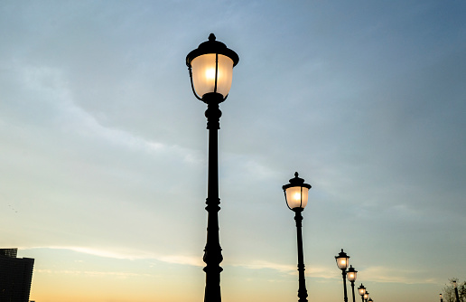 road light under dusk sky