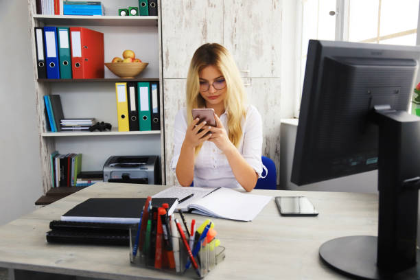 istock Business woman in an office 1268623292