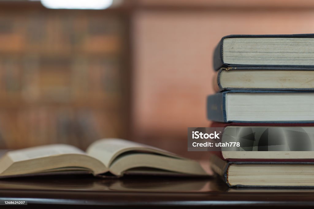 book education books stack and book open on desk in library. education learning concept. Book Stock Photo