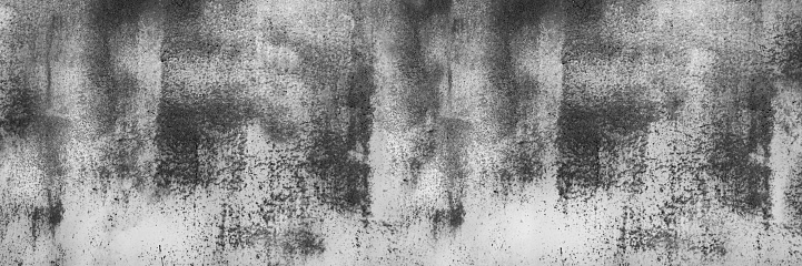 Black and white background. Gray grunge background. Abstract rough background. Old dirty concrete wall texture.