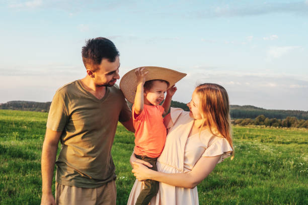 istock Happy family playing on sky background. 1268630882