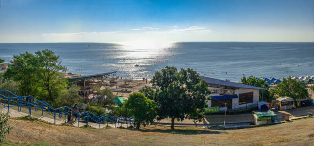 Chernomorsk, Ukraine 08.22.2020. Panoramic view of the Public beach in Chernomorsk city on a sunny summer morning