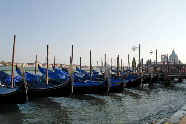 istock Gondolas in the St. Mark's district of Venice 1268632725