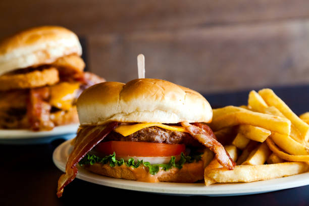 ダブルバーガー アット ダイナー - symmetry burger hamburger cheese ストックフォトと画像